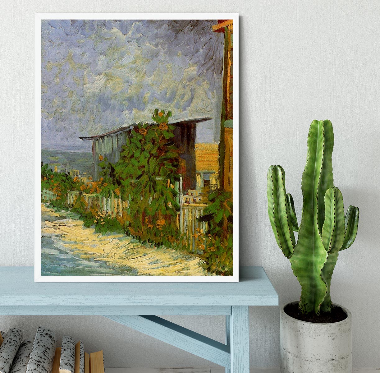 Framed print of Van Gogh's Montmartre Path with Sunflowers, showcasing vibrant colors and intricate details.