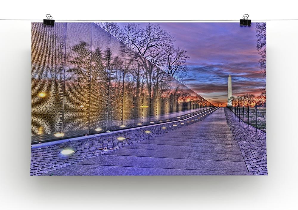 A beautiful canvas print of a monument at sunrise, showcasing vibrant colors and intricate details that enhance any decor.