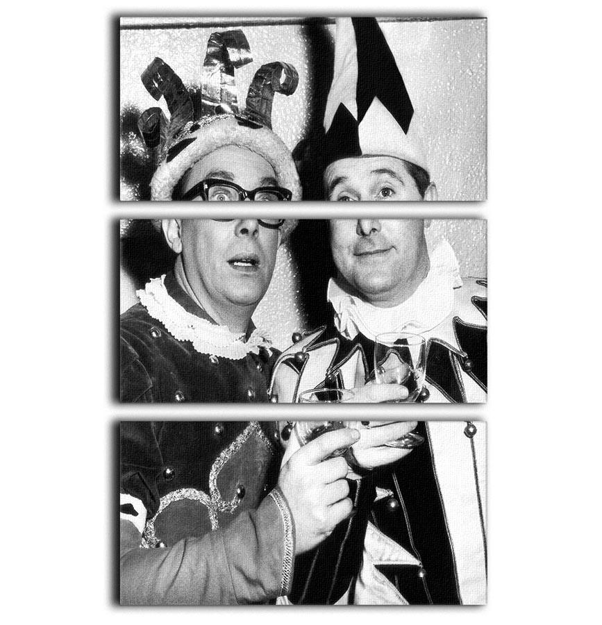 Morecambe and Wise dressed as court jesters on a vibrant 3-panel canvas print, showcasing their playful expressions and colorful costumes.