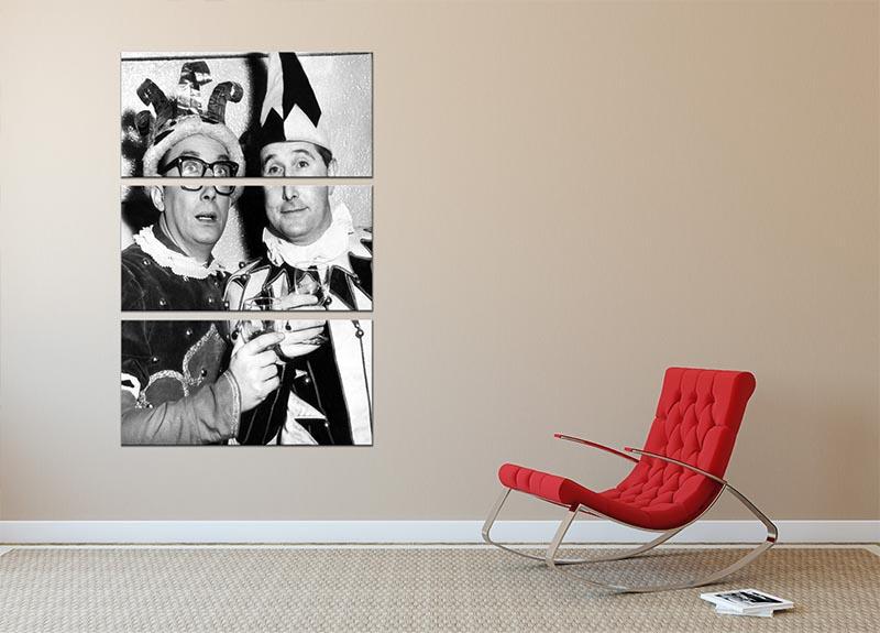 Morecambe and Wise dressed as court jesters on a vibrant 3-panel canvas print, showcasing their playful expressions and colorful costumes.