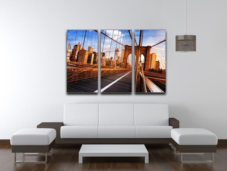 A stunning 3-panel canvas print depicting the Brooklyn Bridge at sunrise, showcasing vibrant colors and intricate details.