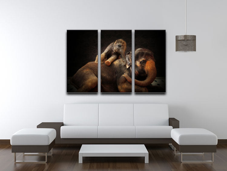 A beautiful 3-panel canvas print featuring a mother and baby elephant, showcasing their bond in a stunning artistic design.
