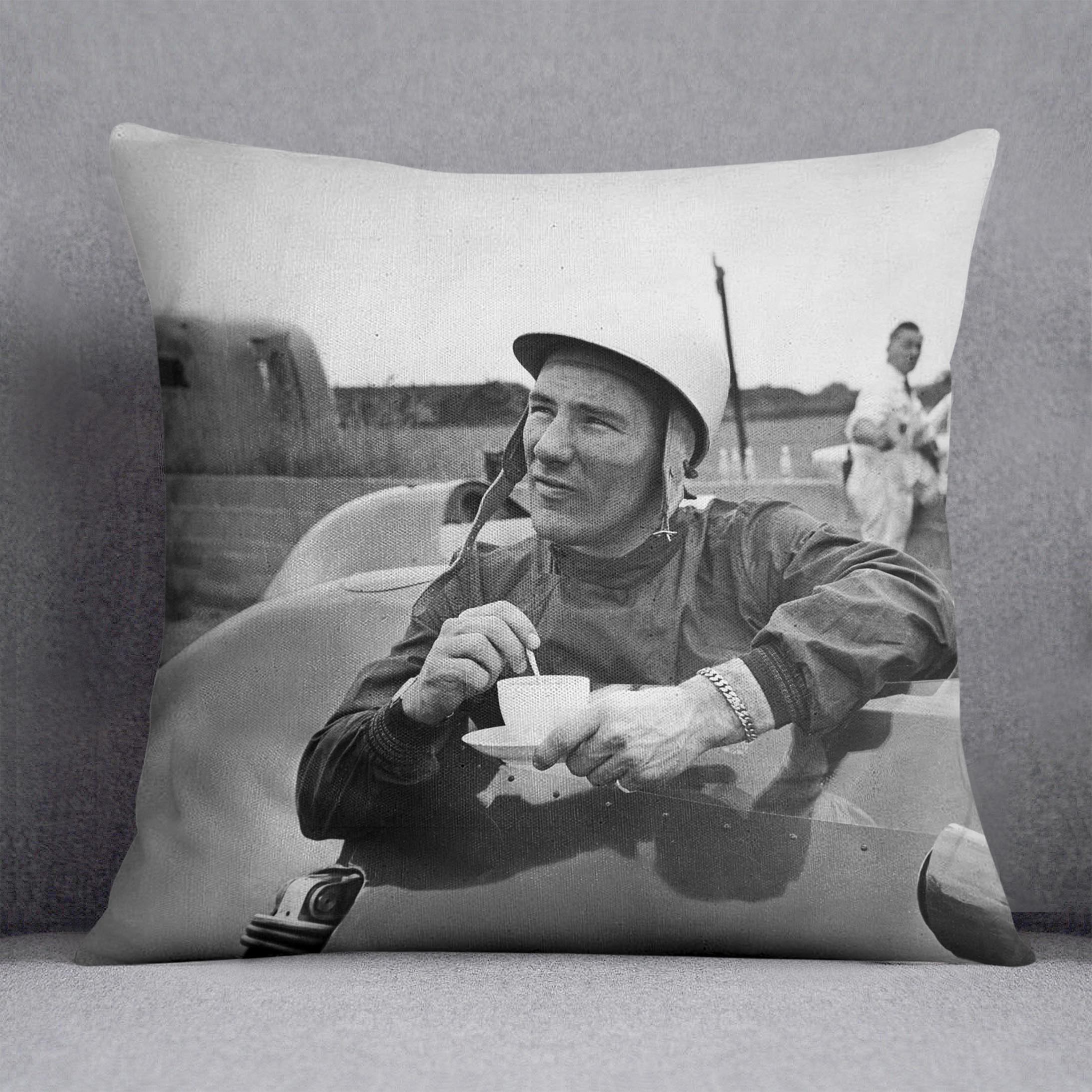 A vibrant Stirling Moss cushion featuring abstract designs on luxurious vegan faux suede, perfect for home decor.