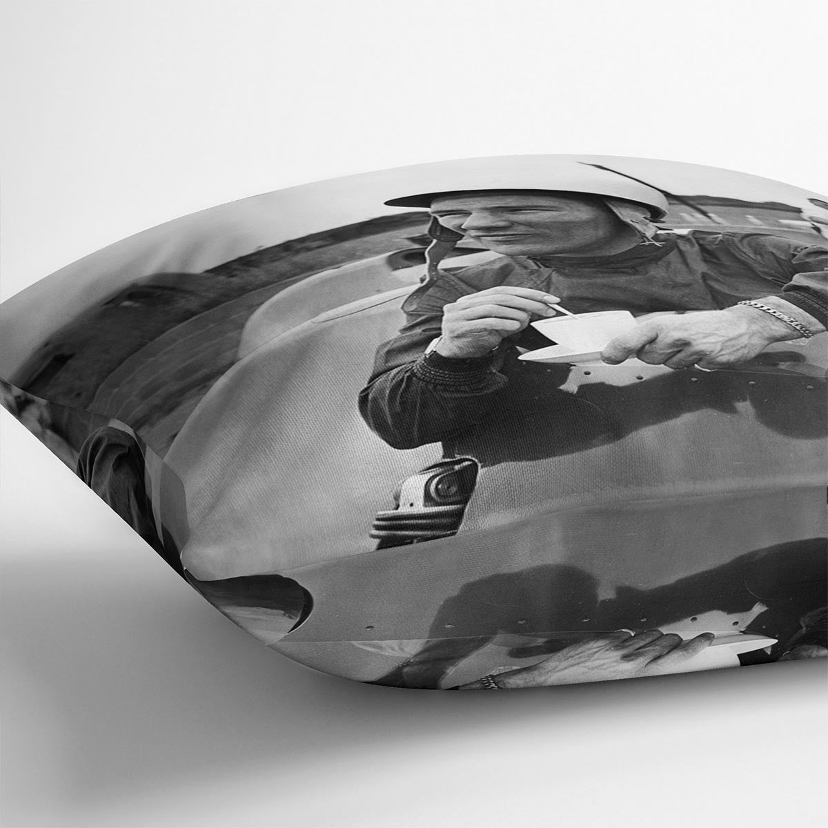 A vibrant Stirling Moss cushion featuring abstract designs on luxurious vegan faux suede, perfect for home decor.