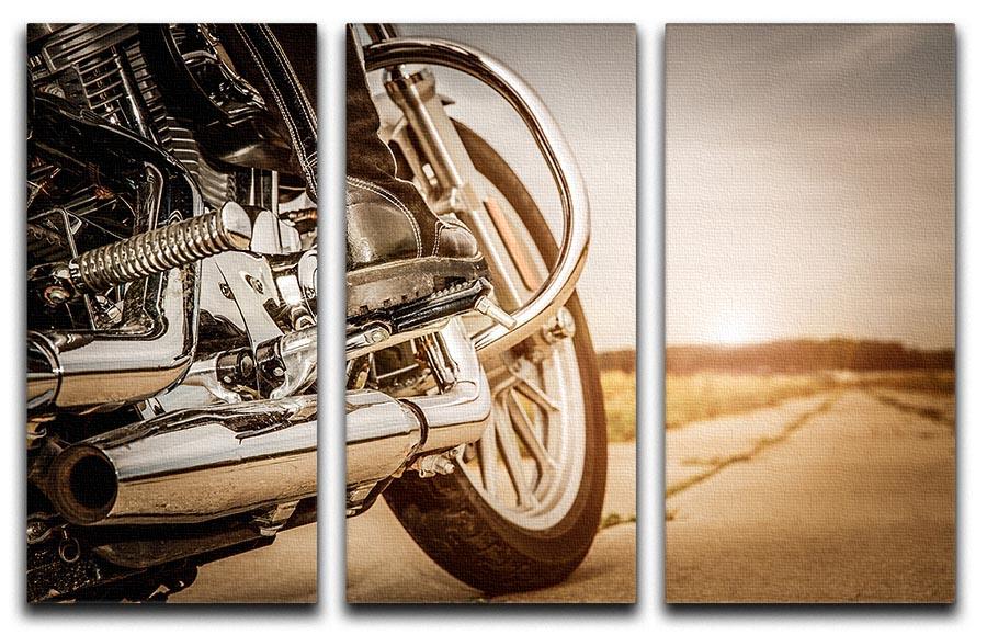 A close-up view of a motorbike depicted in a stunning 3-panel canvas print, showcasing vibrant colors and intricate details.
