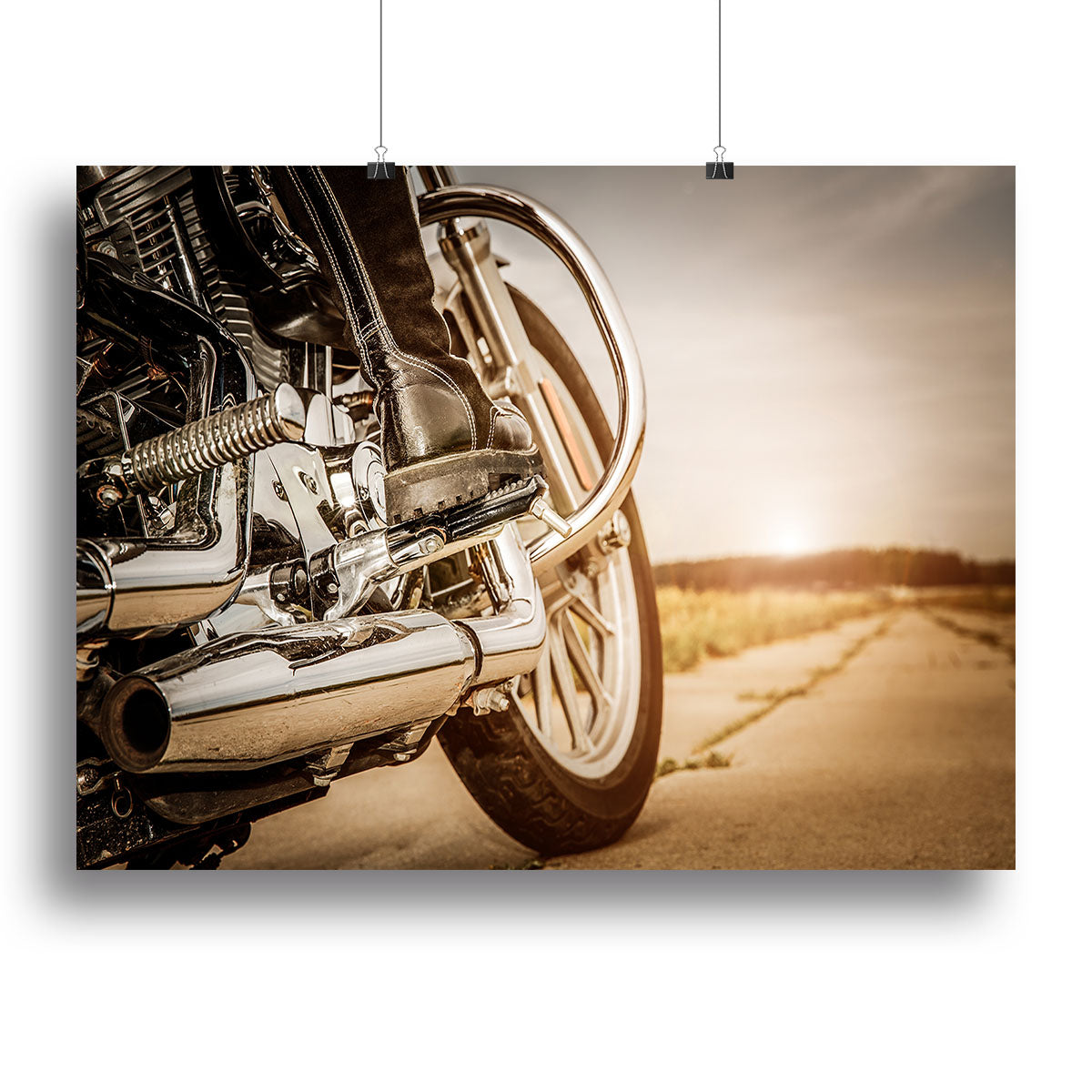 A close-up view of a motorbike captured in vibrant colors on a canvas print, showcasing intricate details and design.