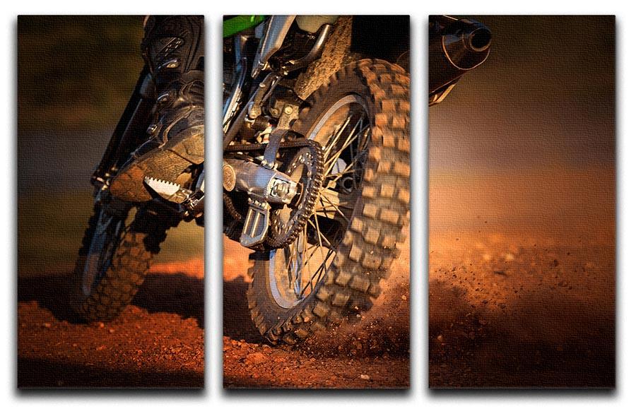 A stunning 3-panel canvas print featuring a motorbike racing on a dirt track, showcasing vibrant colors and dynamic motion.