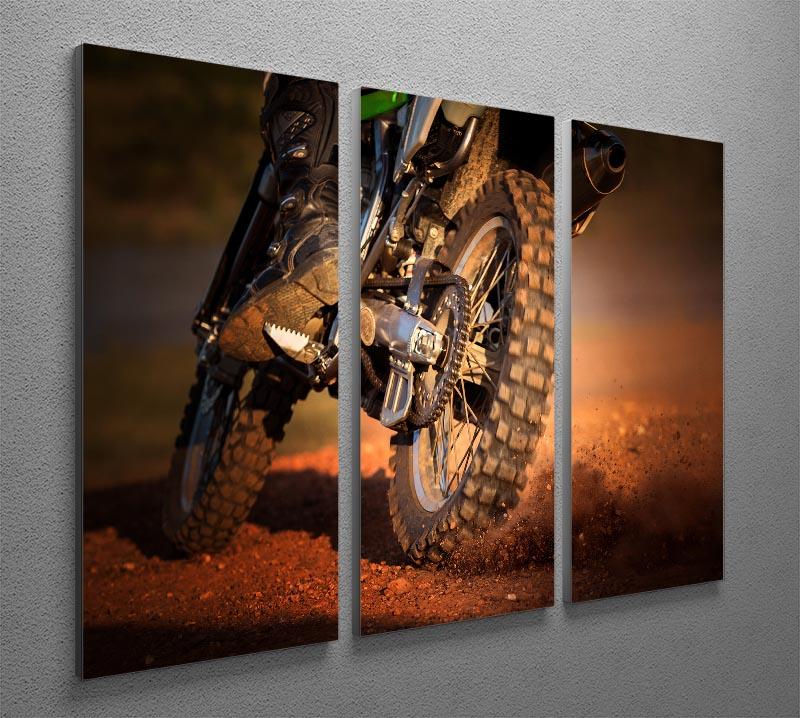 A stunning 3-panel canvas print featuring a motorbike racing on a dirt track, showcasing vibrant colors and dynamic motion.
