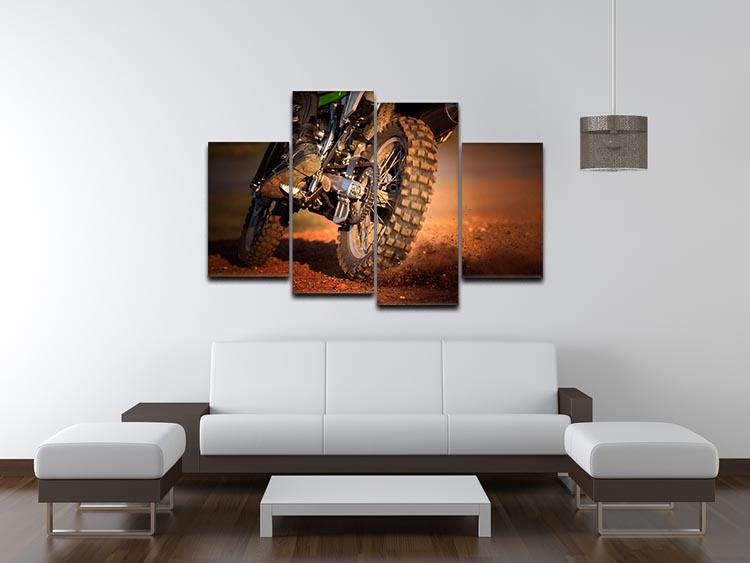 A stunning 4-split canvas artwork featuring a motorbike racing on a dirt track, showcasing dynamic movement and vibrant colors.