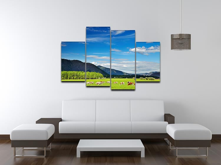 A beautiful 4-split canvas artwork depicting a mountain landscape with grazing cows under a vibrant sky, showcasing nature's tranquility.