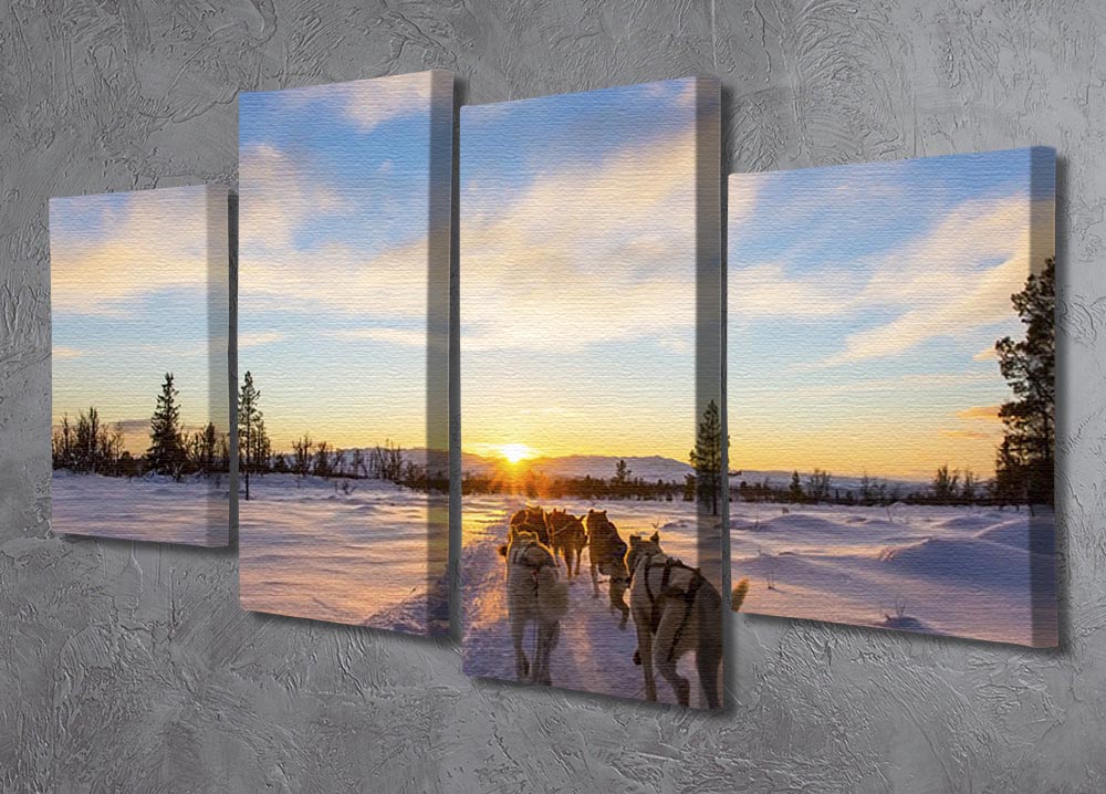 A captivating 4-split canvas artwork depicting a musher and passenger in a dog sleigh, pulled by energetic huskies in a snowy winter landscape.