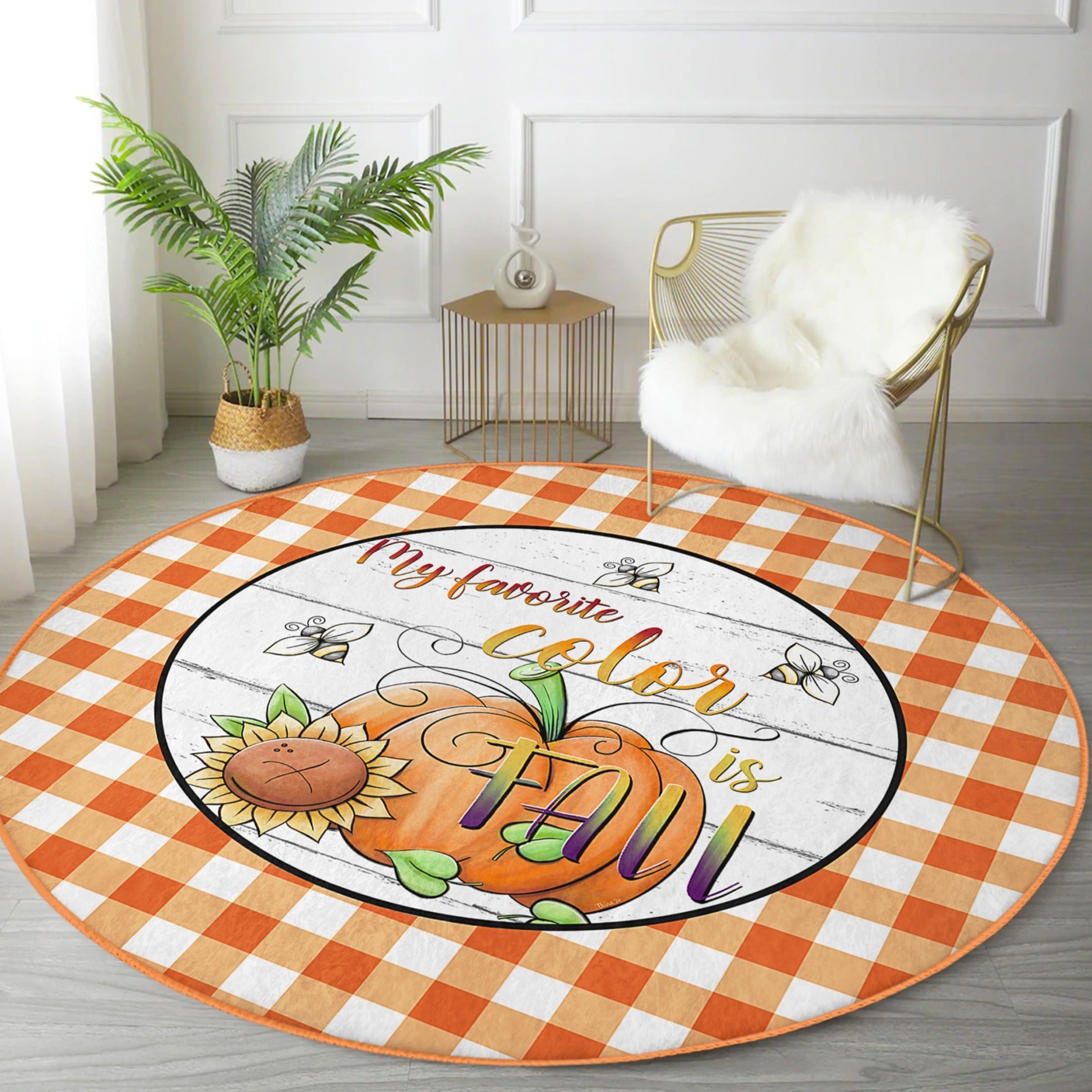 A cozy round rug featuring a fall pattern with vibrant colors, made from soft velvet fabric, perfect for family spaces.