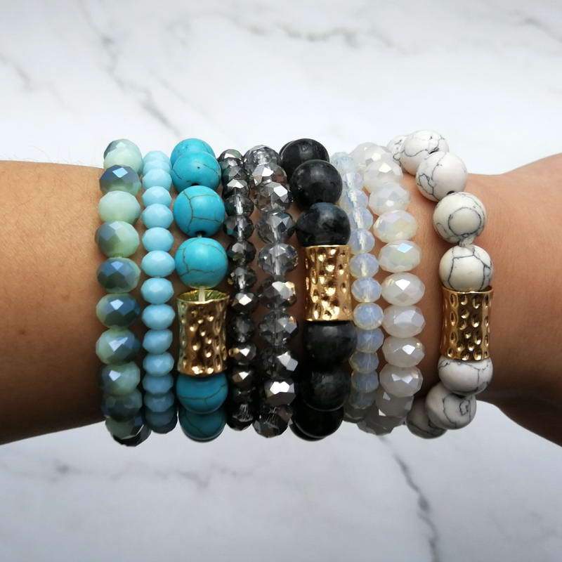 Natural Stone Mala Beads stacked stretch bracelet in various colors, showcasing natural stones and charm design.