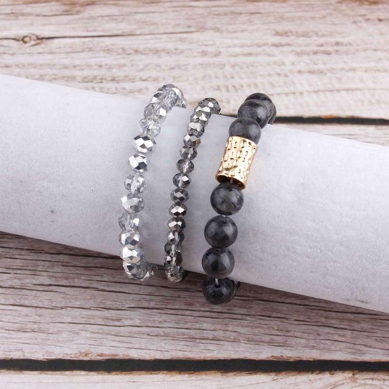 Natural Stone Mala Beads stacked stretch bracelet in various colors, showcasing natural stones and charm design.