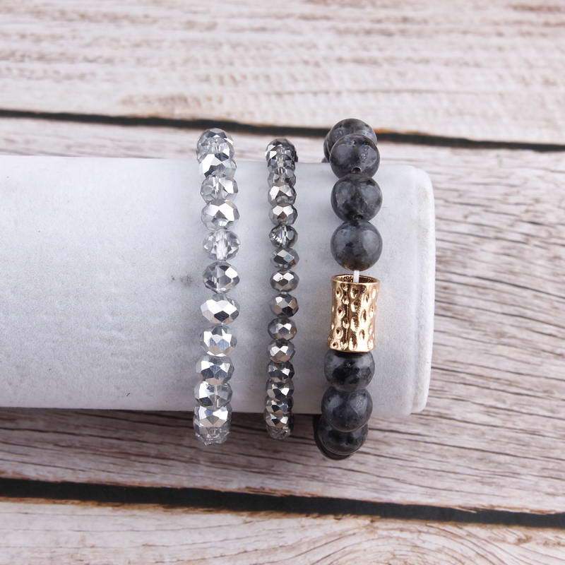 Natural Stone Mala Beads stacked stretch bracelet in various colors, showcasing natural stones and charm design.