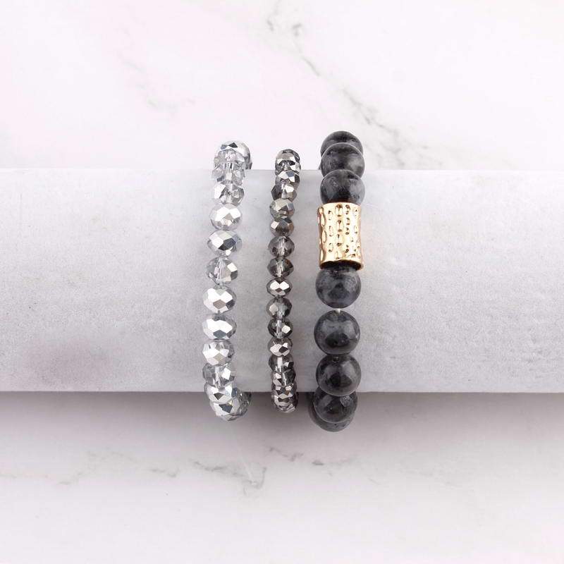 Natural Stone Mala Beads stacked stretch bracelet in various colors, showcasing natural stones and charm design.