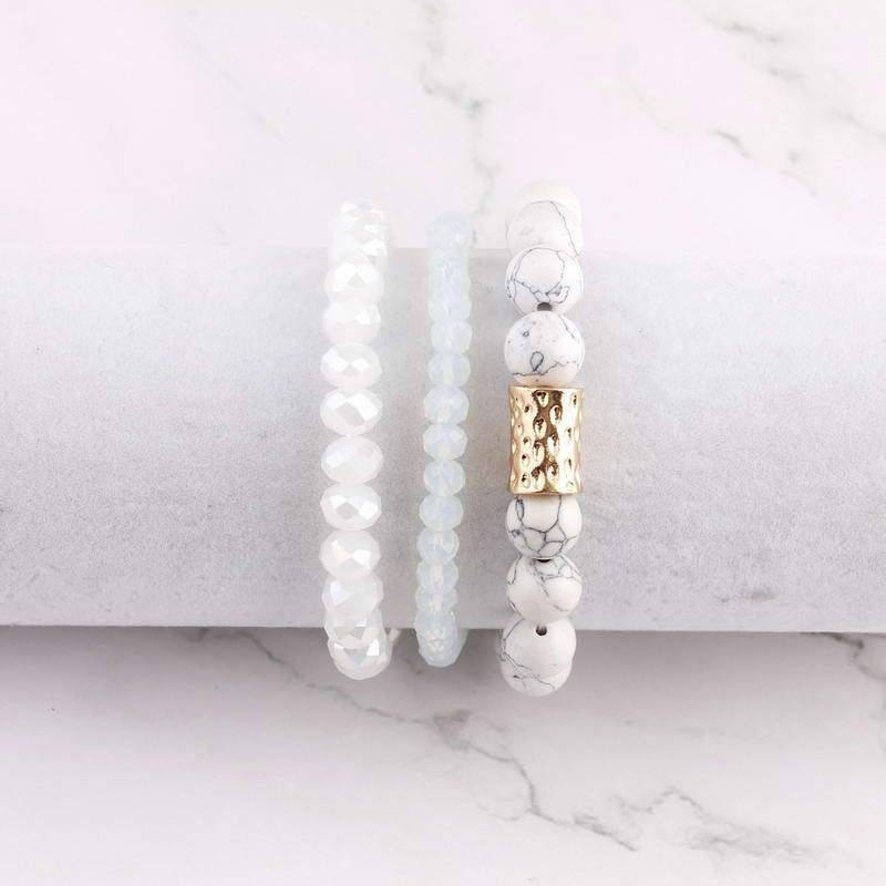 Natural Stone Mala Beads stacked stretch bracelet in various colors, showcasing natural stones and charm design.