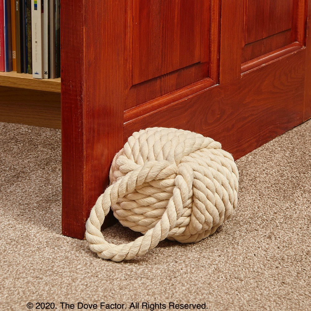 Nautical Rope Knot Fabric Door Stop in off white, tan, cream, and egg shell colors, featuring a soft cotton texture and integrated handle.
