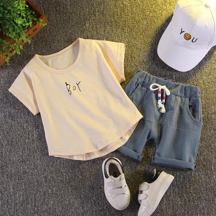 New Baby Boys Black and White T-shirt with plaid shorts suit, perfect for summer wear.