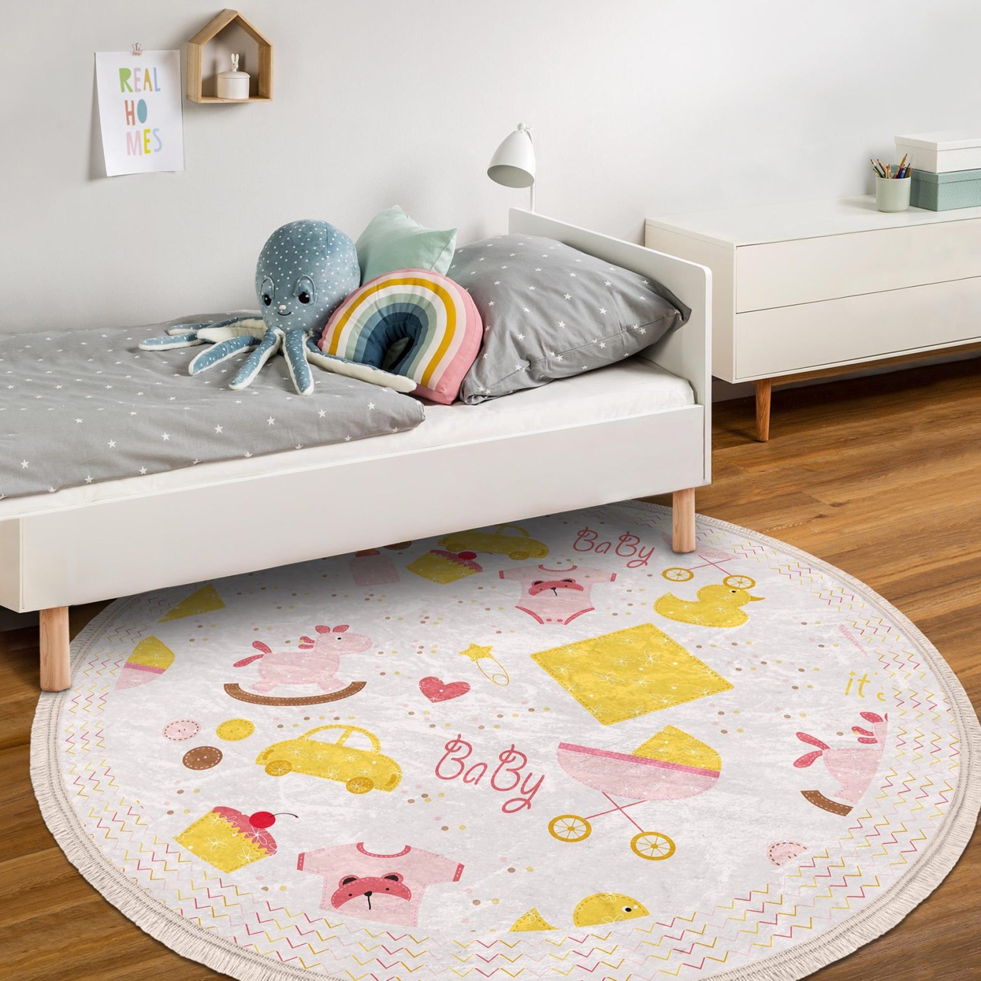 A decorative round rug for newborns, featuring shiny velvet fabric and fringes, perfect for nursery rooms.