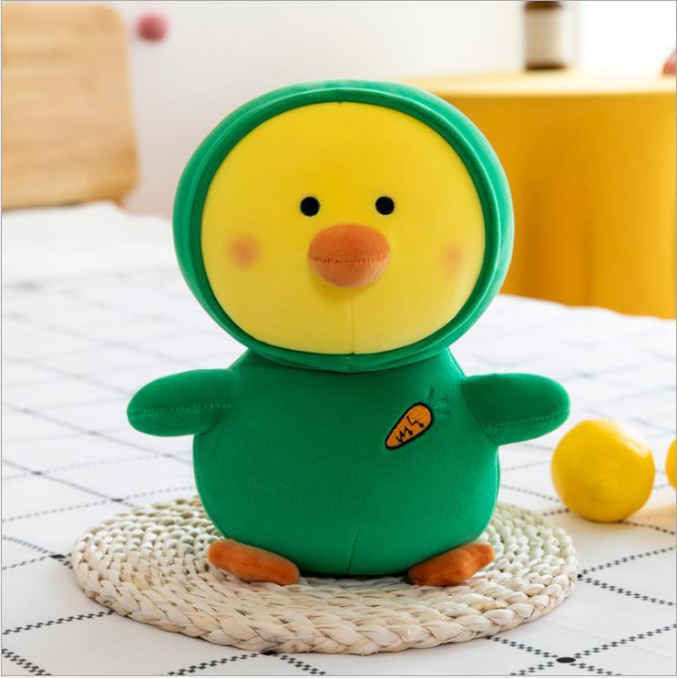 A collection of Kawaii plush toys including a duck, dinosaur, and rabbit, showcasing their vibrant colors and soft textures, perfect for kids.