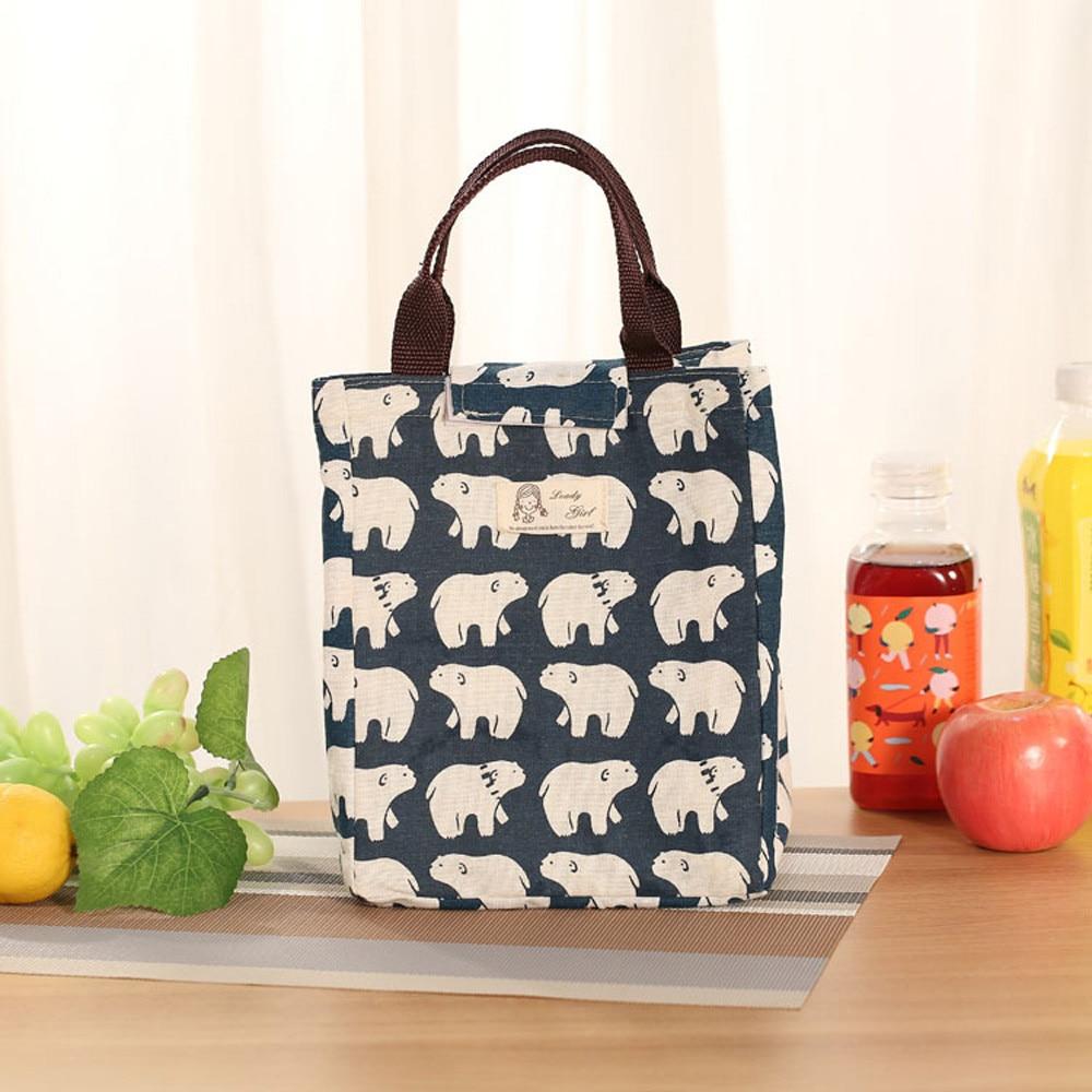 Stylish New Fashion Portable Lunch Bag made of canvas with insulated aluminum lining, perfect for picnics and daily meals.