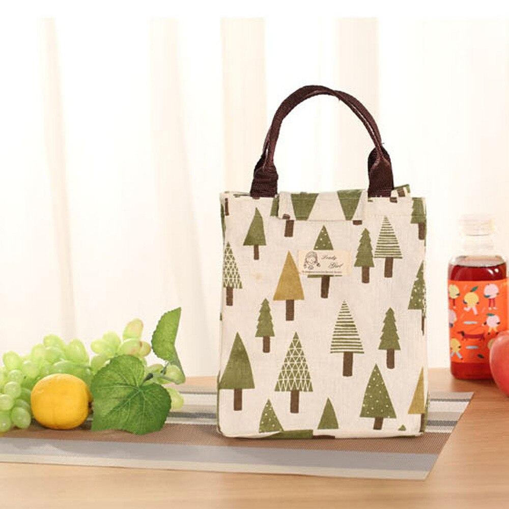 Stylish New Fashion Portable Lunch Bag made of canvas with insulated aluminum lining, perfect for picnics and daily meals.