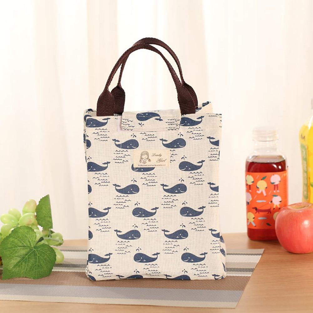 Stylish New Fashion Portable Lunch Bag made of canvas with insulated aluminum lining, perfect for picnics and daily meals.