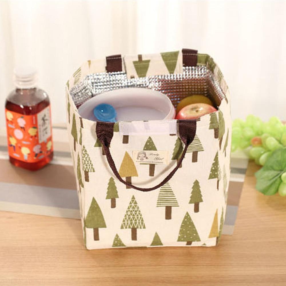 Stylish New Fashion Portable Lunch Bag made of canvas with insulated aluminum lining, perfect for picnics and daily meals.