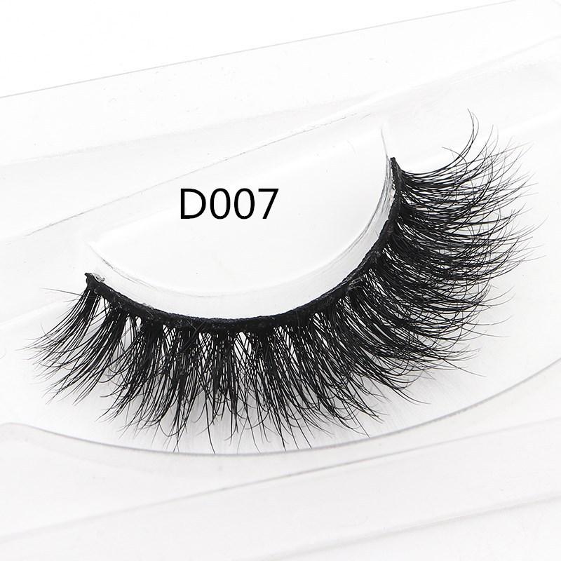 A pair of luxurious 3D mink false eyelashes with a thick and messy design, perfect for dramatic eye looks.