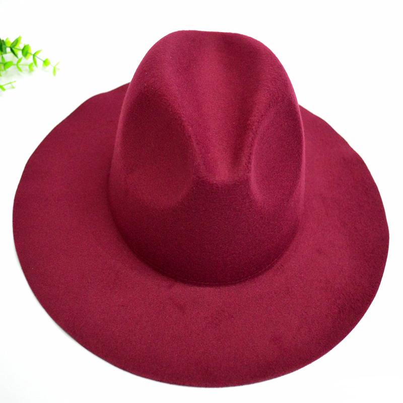 A stylish New Women Wool Felt Fedora Hat with a wide brim, available in multiple colors, showcasing its soft material and trendy design.