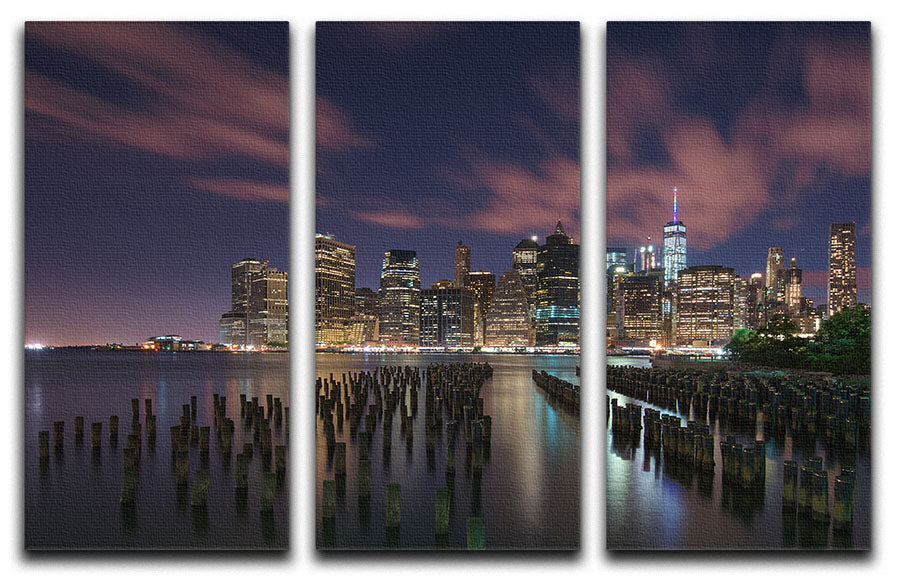 A stunning 3-panel canvas print depicting New York City at night, showcasing vibrant lights and iconic skyline.