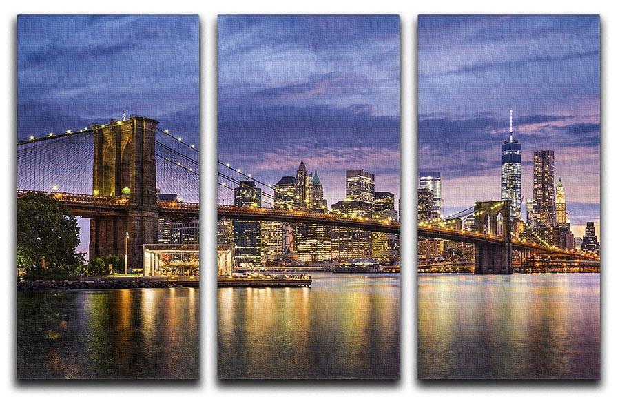 A stunning 3-panel canvas print depicting New York City at twilight, showcasing the skyline with vibrant colors.