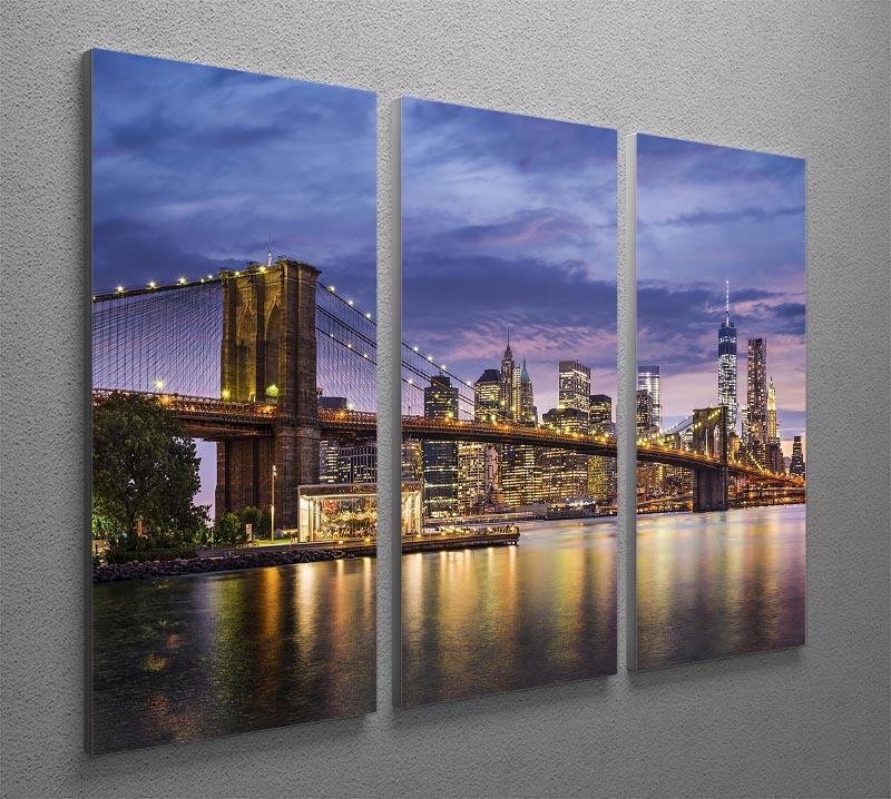 A stunning 3-panel canvas print depicting New York City at twilight, showcasing the skyline with vibrant colors.