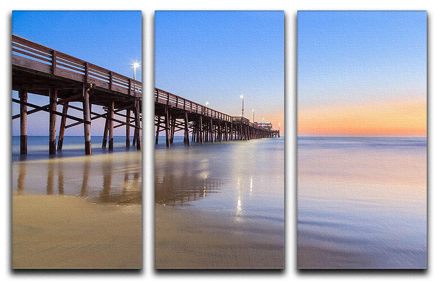 A stunning 3-panel canvas print depicting Newport Beach pier at sunset, showcasing vibrant colors and serene ocean views.