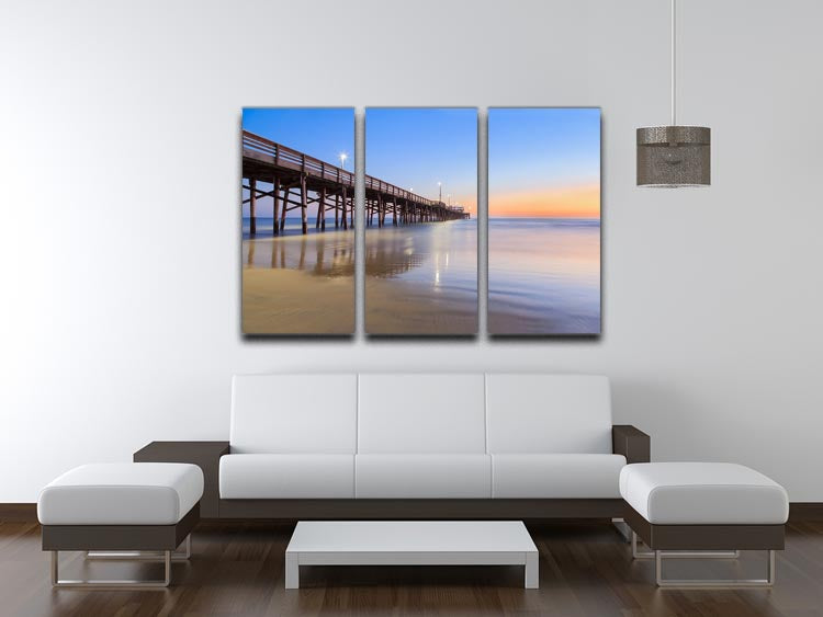 A stunning 3-panel canvas print depicting Newport Beach pier at sunset, showcasing vibrant colors and serene ocean views.