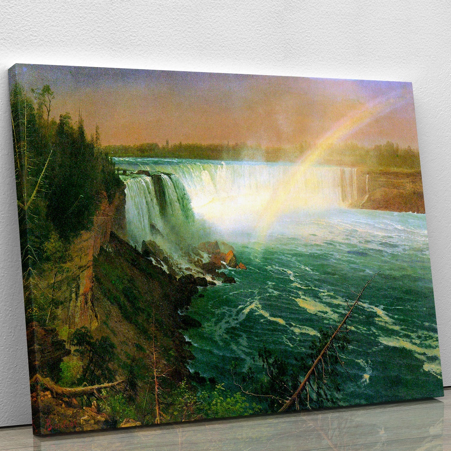 A beautiful canvas print of Niagra Falls, showcasing the stunning waterfall surrounded by lush greenery and a clear blue sky.