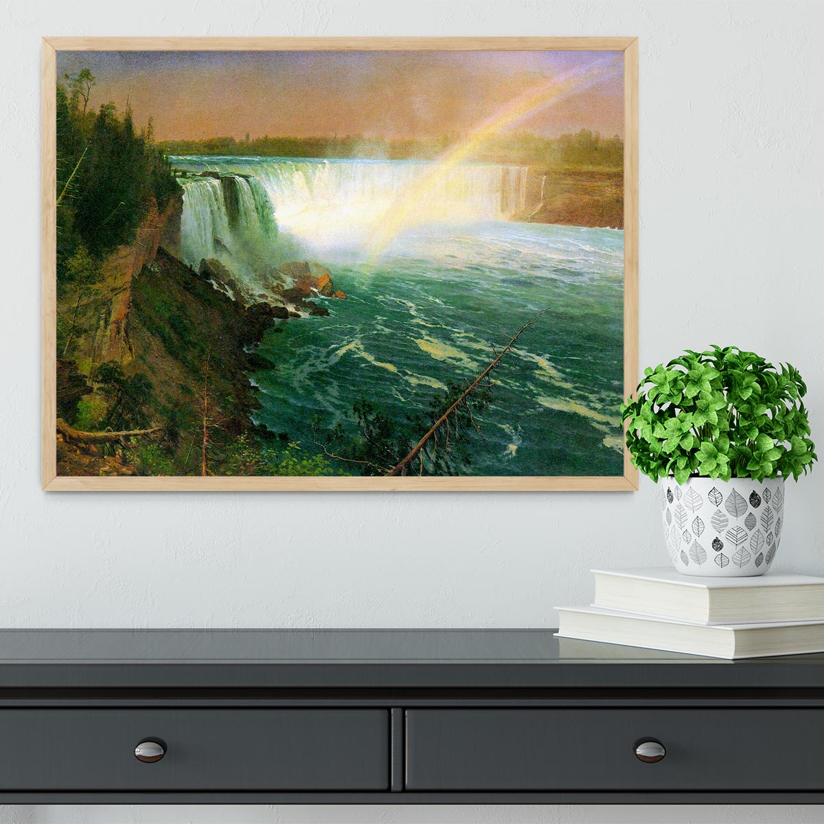 Framed print of Niagra Falls by Bierstadt, showcasing vibrant colors and intricate details in a handmade frame.
