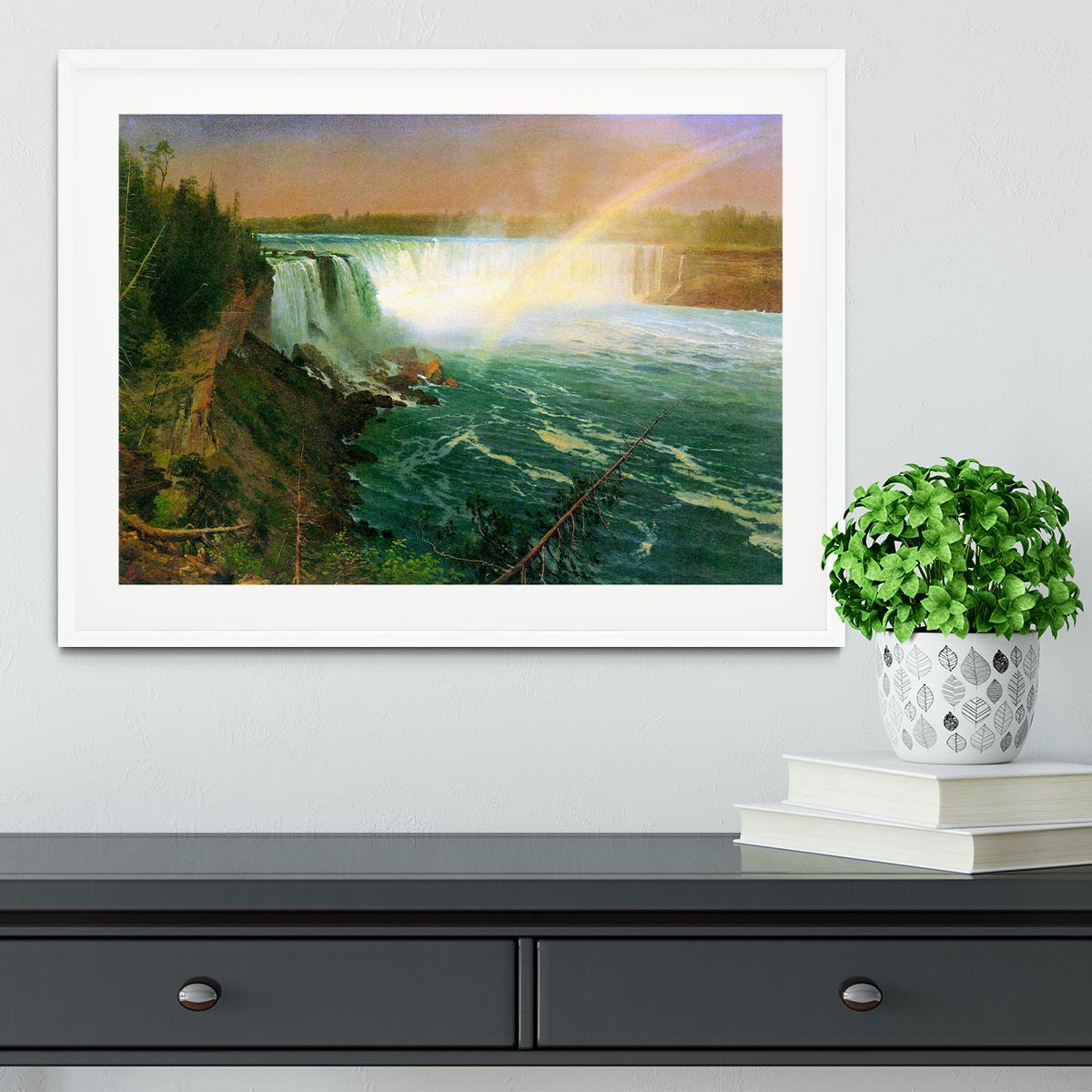 Framed print of Niagra Falls by Bierstadt, showcasing vibrant colors and intricate details in a handmade frame.
