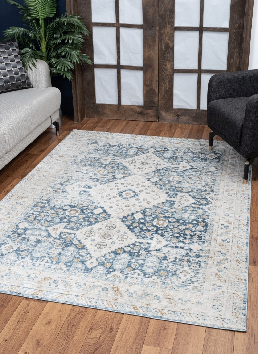 Noble Blue 5 ft. 3 in. x 7 ft. 3 in. Area Rug featuring a rich navy color and intricate medallion patterns, perfect for enhancing home decor.