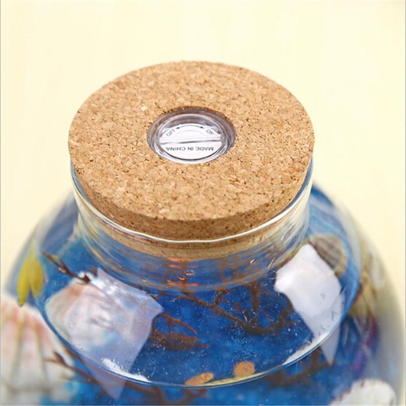 Novelty RGB LED Night Lamp featuring a romantic sea fish design in a glass ocean bottle, perfect for children's bedroom decor.