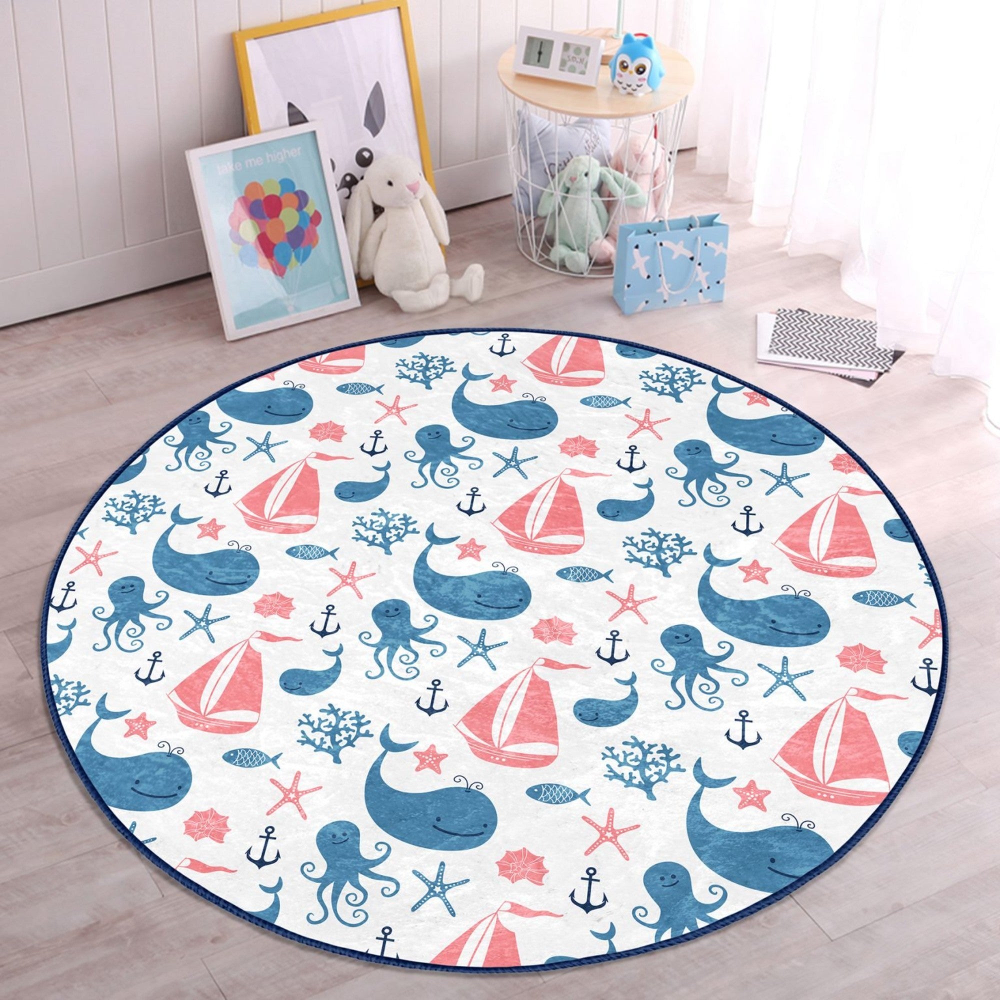 A colorful round rug featuring various ocean animals, designed for kids' rooms, showcasing vibrant colors and a soft texture.