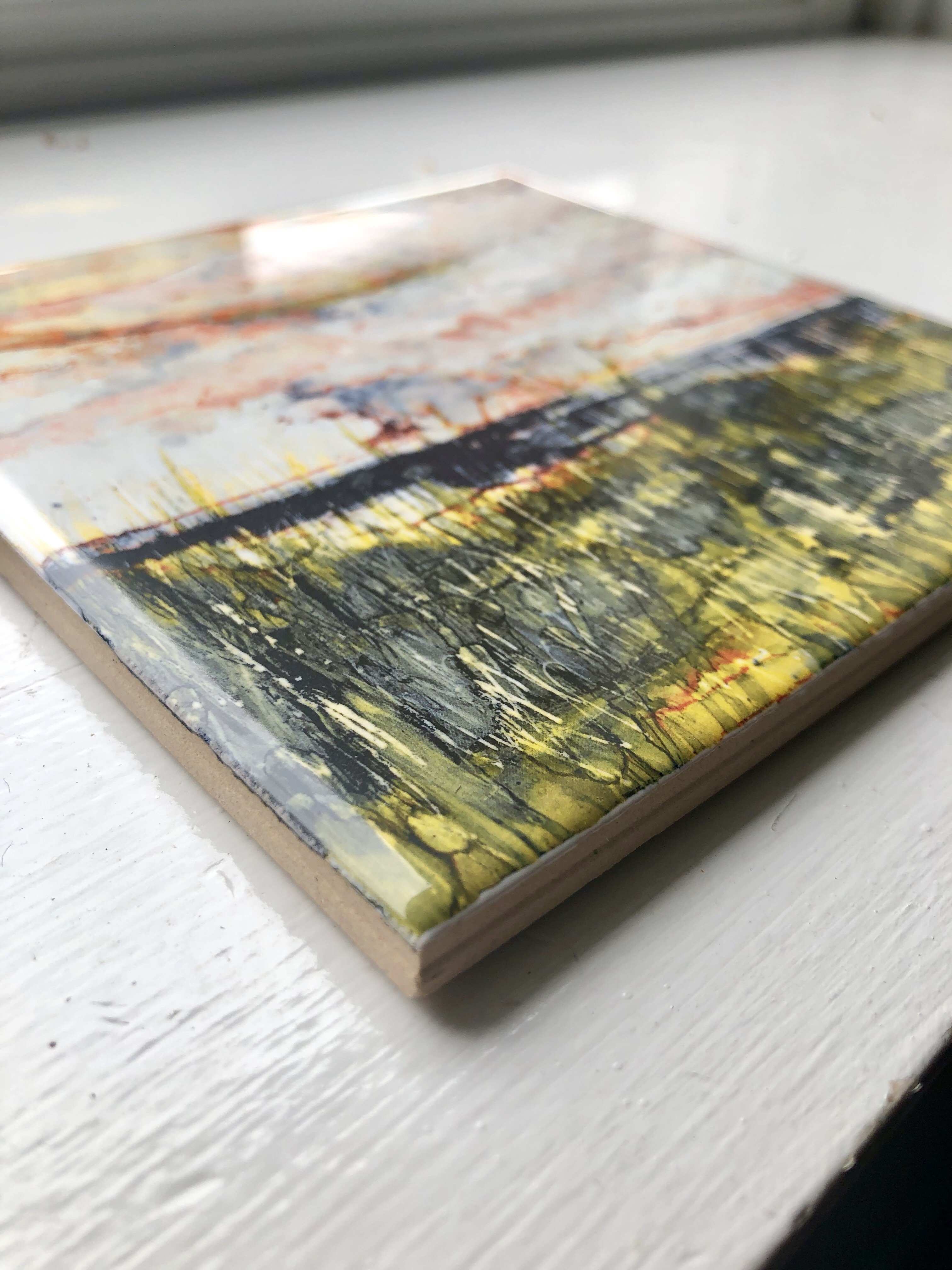 Ocean Storm Ceramic Tile featuring a vibrant ocean design, suitable for indoor and outdoor use, showcasing a shiny finish and smooth texture.