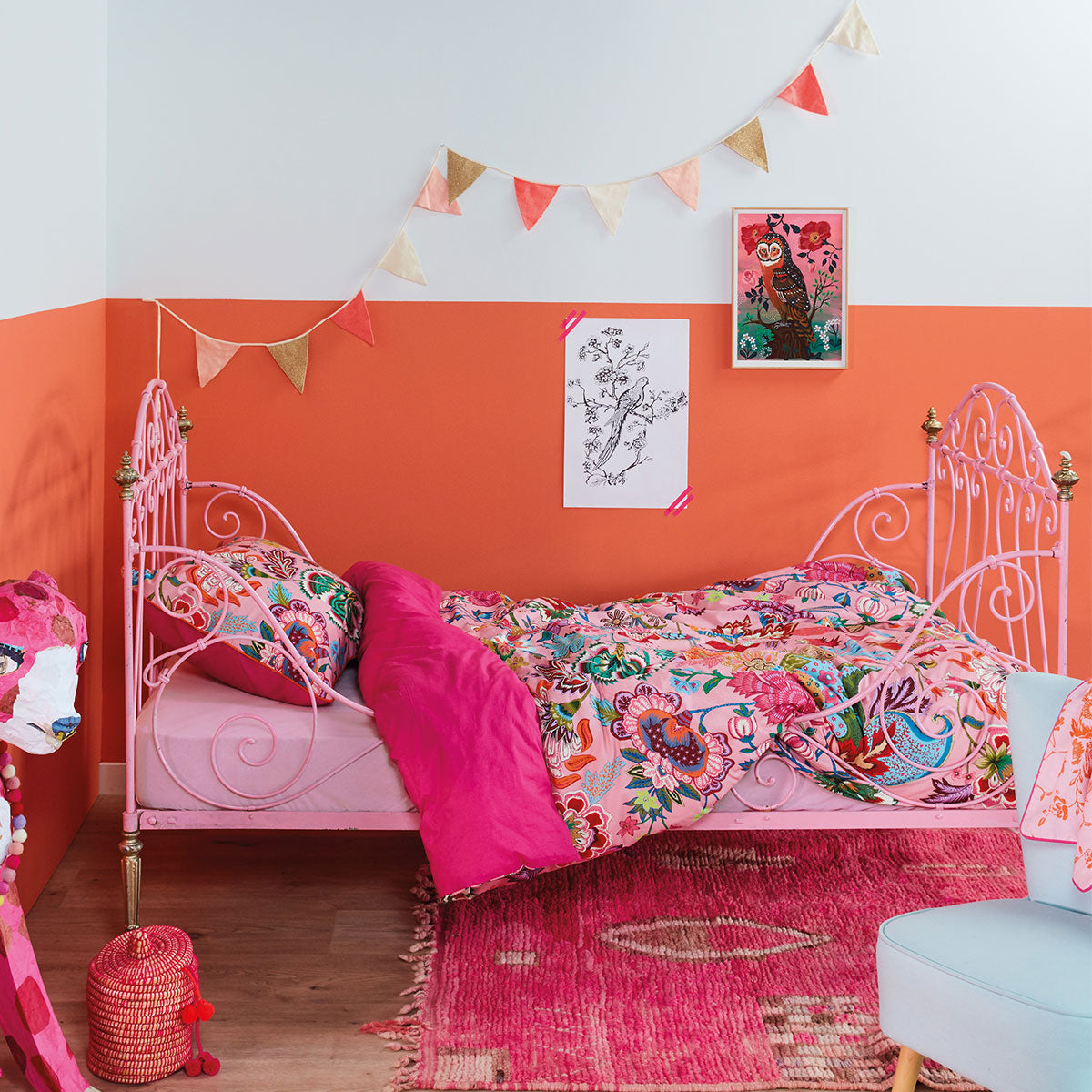 Oilily Amelie Sits Pink Cotton Quilt Cover Set featuring a colorful paisley print on a pink background with a solid dark pink reverse.