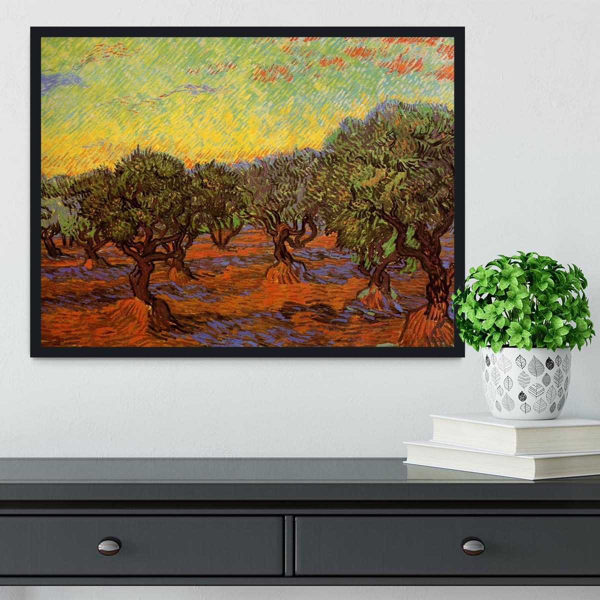 Framed print of Olive Grove Orange Sky by Van Gogh, showcasing vibrant colors and intricate details in a stylish frame.