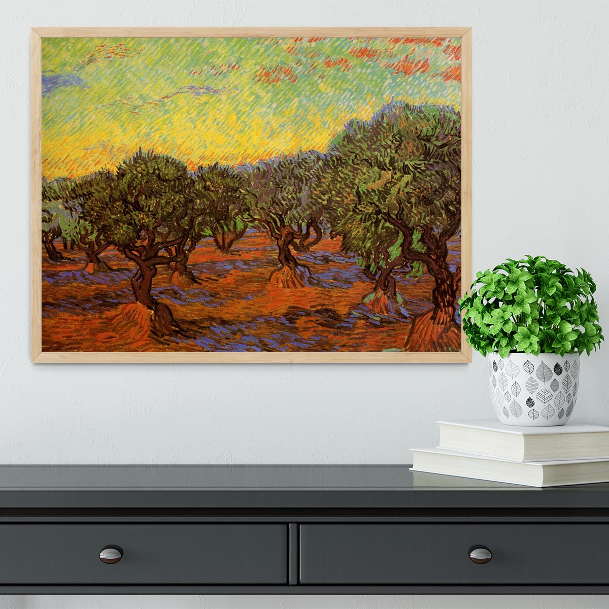 Framed print of Olive Grove Orange Sky by Van Gogh, showcasing vibrant colors and intricate details in a stylish frame.