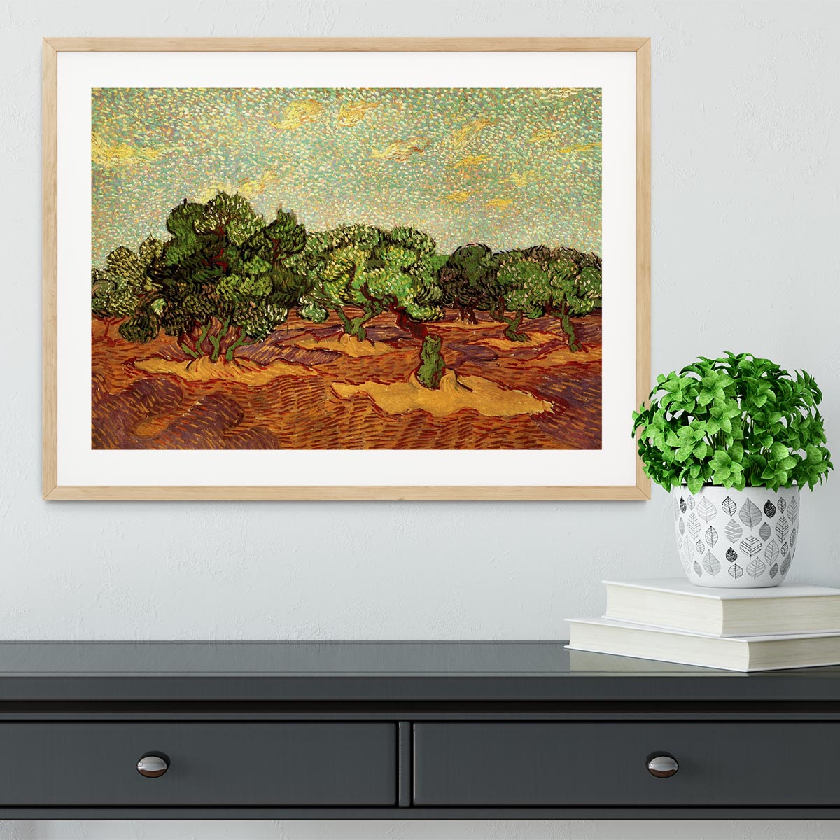 Framed print of Olive Grove Pale Blue Sky by Van Gogh, showcasing vibrant colors and intricate details in a stylish frame.