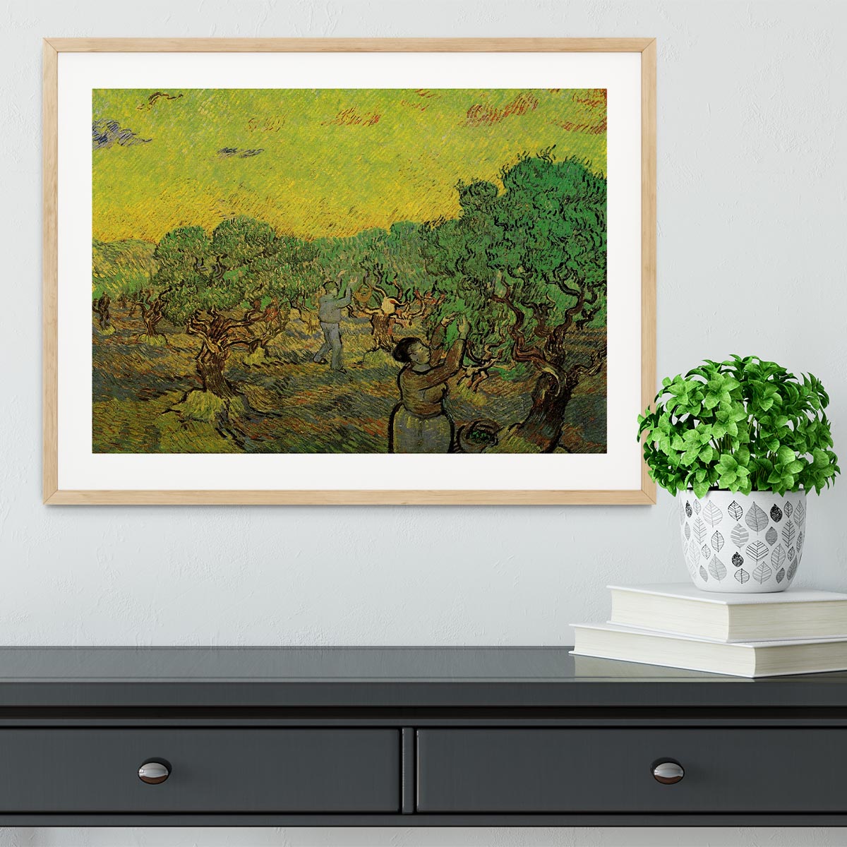 Framed print of Olive Grove with Picking Figures by Van Gogh, showcasing vibrant colors and intricate details in a stylish frame.