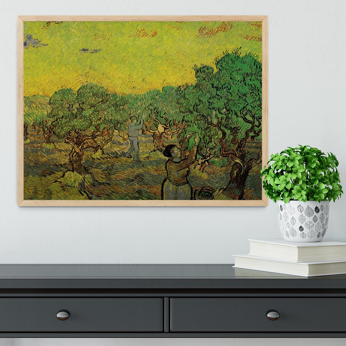 Framed print of Olive Grove with Picking Figures by Van Gogh, showcasing vibrant colors and intricate details in a stylish frame.