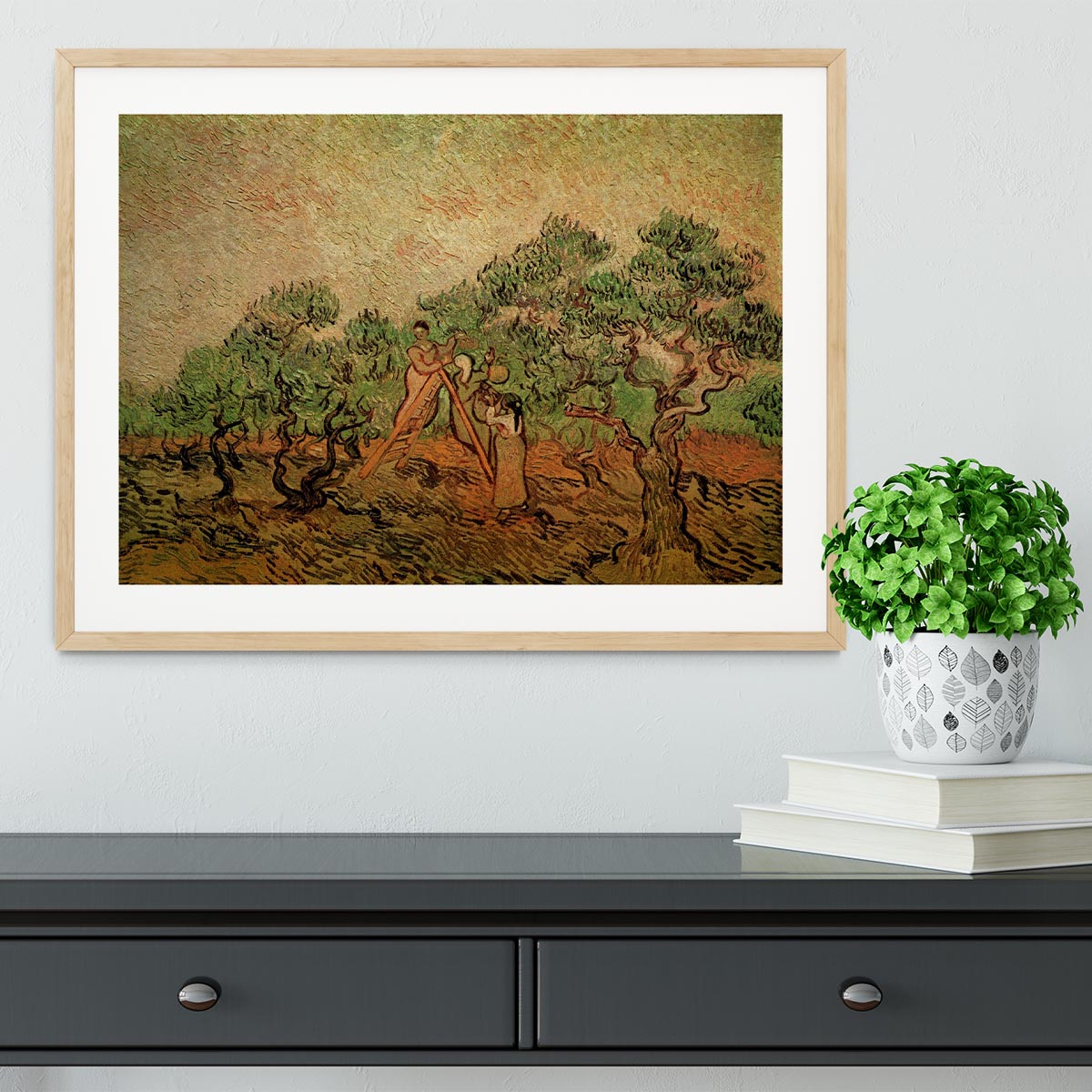 Framed print of Olive Picking by Van Gogh, showcasing vibrant colors and intricate details in a stylish frame.